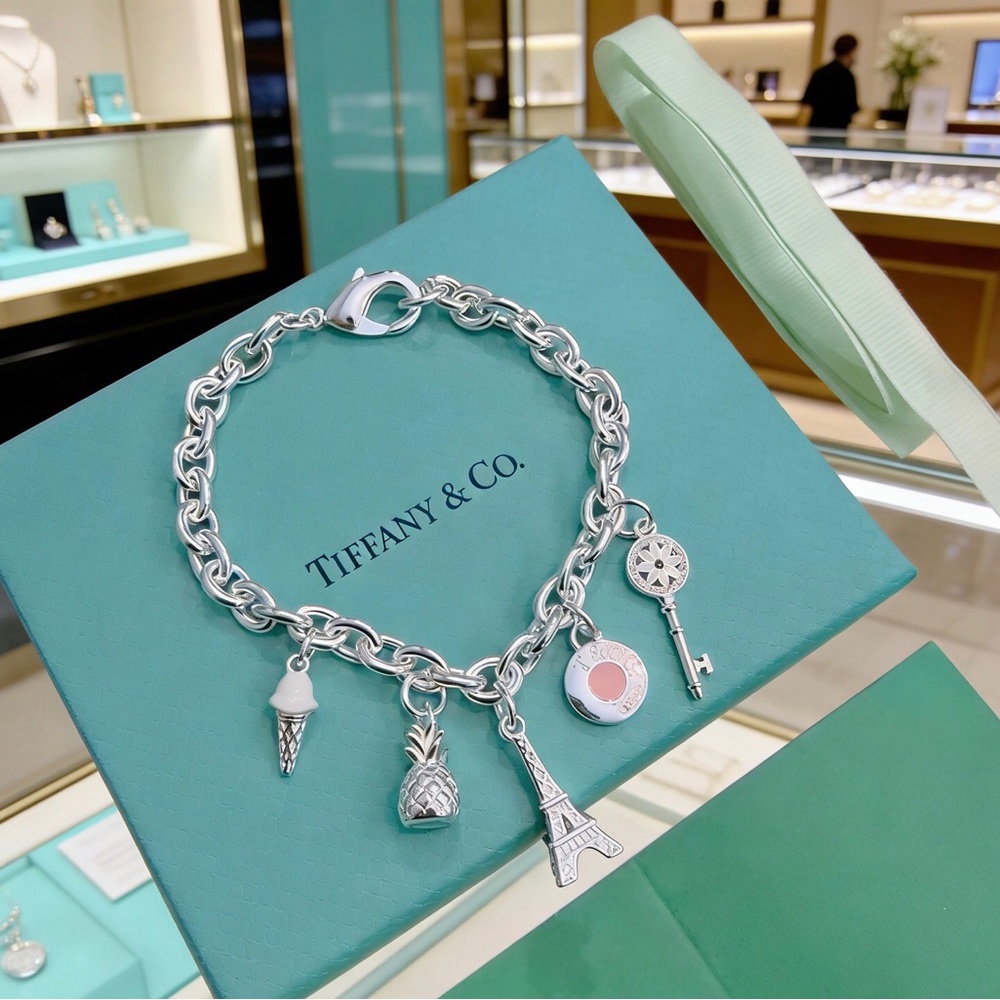 Tiffany & Co. Silver Charm Bracelet with Colorful Accents